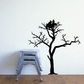 Tree wall decal with black silhouette, nest on branches and perched bird