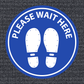 Blue round non-slip flooring sticker with 'PLEASE WAIT HERE' text and white feet icon