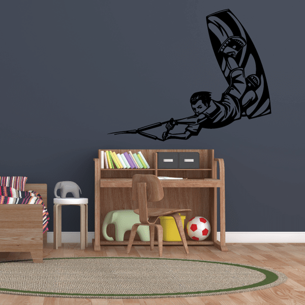 Wakeboarding decal with black wakeboard and rider graphic