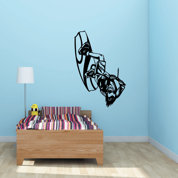 Wakeboarding backroll decal with black rider graphic doing double half cab