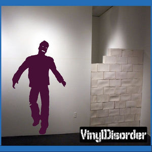 Zombie in suit silhouette wall decal, dark purple, full-body standing pose