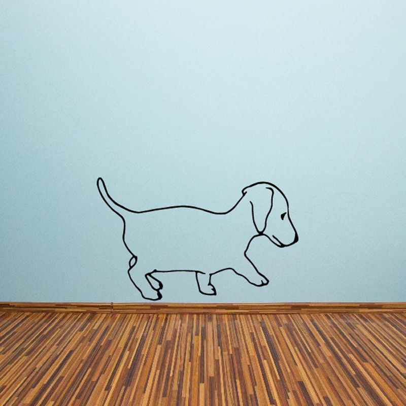 Walking puppy decal with thin black outline and light fill, mid-stride stance