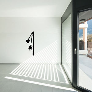 War flail decal with black chain-and-mace weapon icon on wall