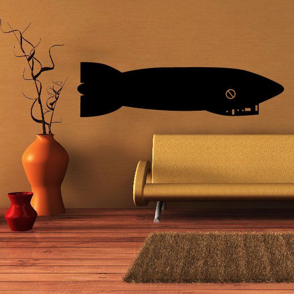 Black zeppelin silhouette decal with round porthole details and tail fins.