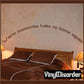 Wall decal with the words "Warm memories take us home again" in dark script