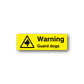 Yellow rectangular warning sticker with triangle icon and text “Warning Guard dogs”