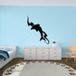 Dolphin silhouette wall decal with wave lines, dark graphic on light background