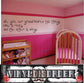 Wall decal with cursive quote: two things—one roots, other wings.