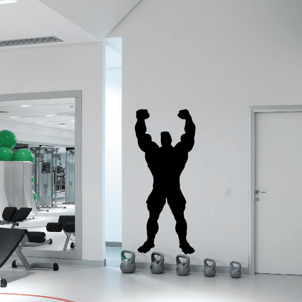 Weightlifting wall decal, black bodybuilder silhouette with arms raised and dumbbells