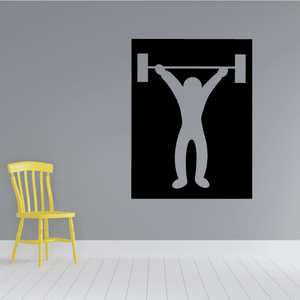 Weightlifting vinyl wall decal with barbell lifter silhouette in black and gray.