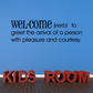 Wall decal with welcome definition text and Kids Room lettering.