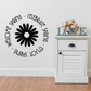 Round wall decal with black daisy center and curved spring greeting text