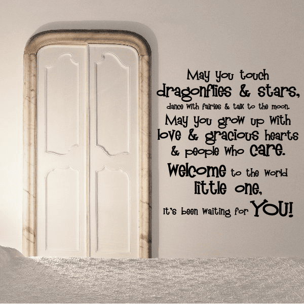 Wall decal with whimsical lettering quote: “Welcome to the world little one, You!”