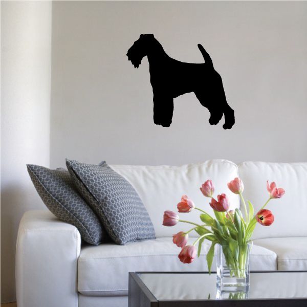 Welsh Terrier decal with black standing dog silhouette on a wall