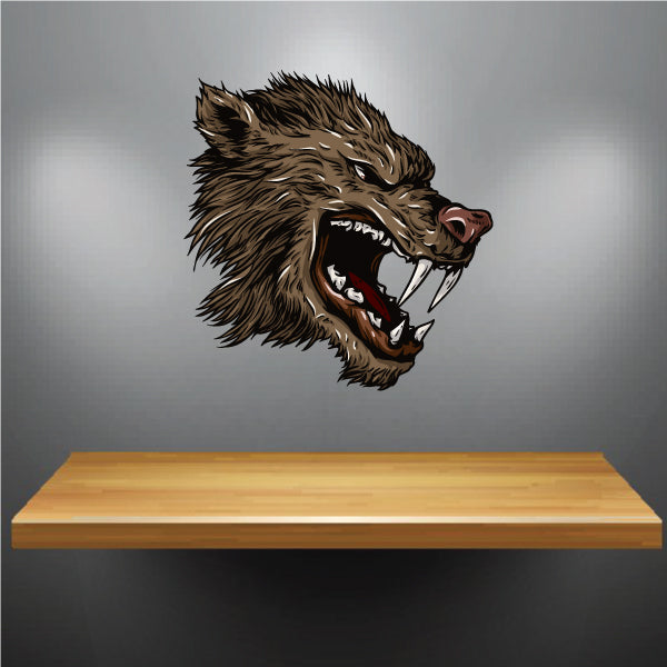 Werewolf head sticker with snarling brown-black wolf face, sharp fangs, red eye.