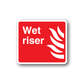 Red wet riser sticker with white text 'Wet riser' and flame icon