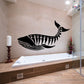 Whale Bones wall decal: black whale silhouette with ribcage bone pattern.