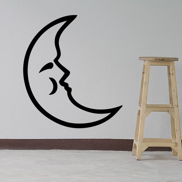 Crescent moon wall decal with stylized smiling face in black