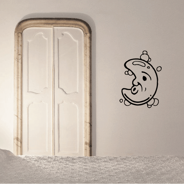 Moon-shaped decal with whistling face and bubble accents