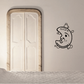 Moon-shaped decal with whistling face and bubble accents