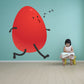 Walking egg sticker: red egg character with face, legs, and musical notes