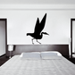 Black whooping crane stretching wings wall decal with raised legs and beak