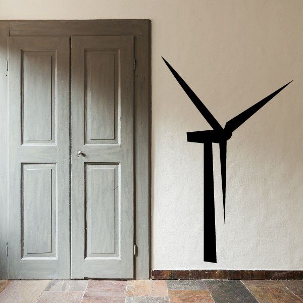 Wind turbine decal with black rotating blades on a smooth wall