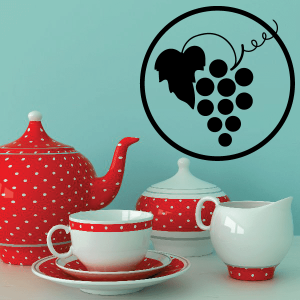 Grape bunch wine decal in circular black outline with vine leaves