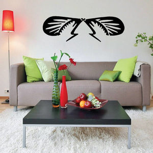 Insect decal with wings and antenna, black butterfly-like silhouette