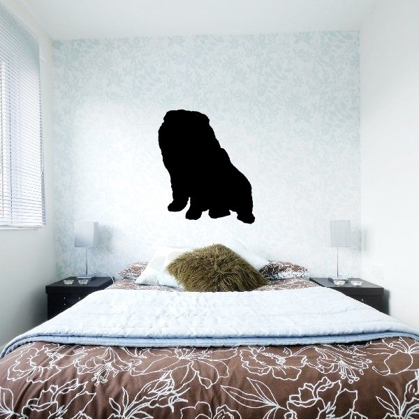 Black dog silhouette decal on light surface