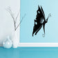 Butterfly wall decal, black silhouette with white speckled wings and curled antennae
