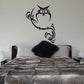 Black owl wall decal with curly feet and wispy whisker lines