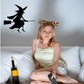 Black witch sitting on broomstick wall decal silhouette