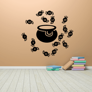Witches Brew candy game wall decal with black cauldron and numbered candy shapes
