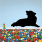 Reclining wolf howling wall decal, black silhouette