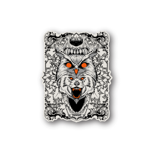 Vinyl wolf sticker with white fur, orange eyes, and ornate black-and-white border