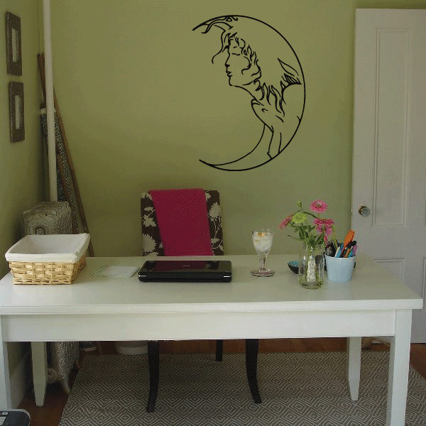 Moon wall decal with a woman's face in black line art