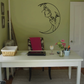 Moon wall decal with a woman's face in black line art