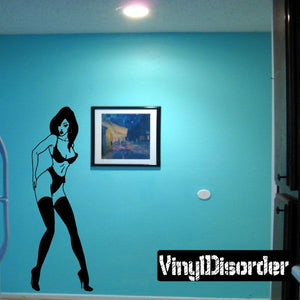 Black silhouette lingerie woman wall decal with raised arms