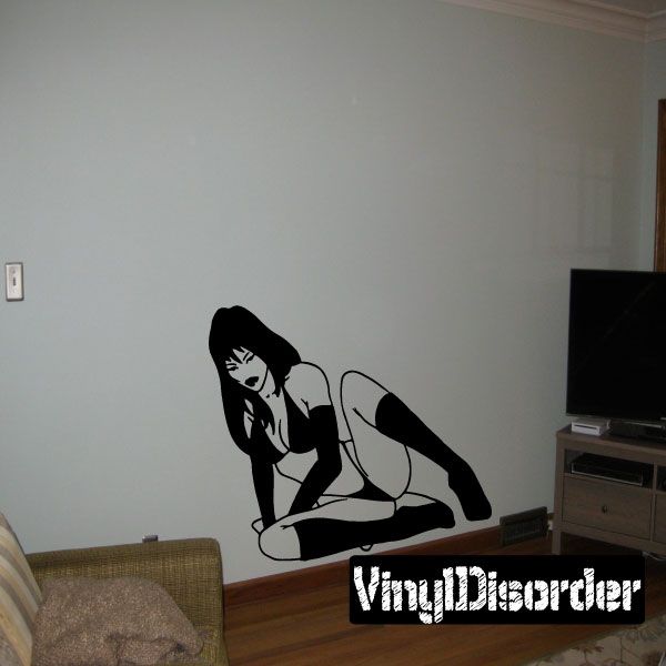 Black woman bikini decal with knee-high boots in seated pose