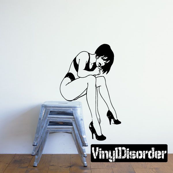 Bikini woman fixing heels wall decal, black outline figure