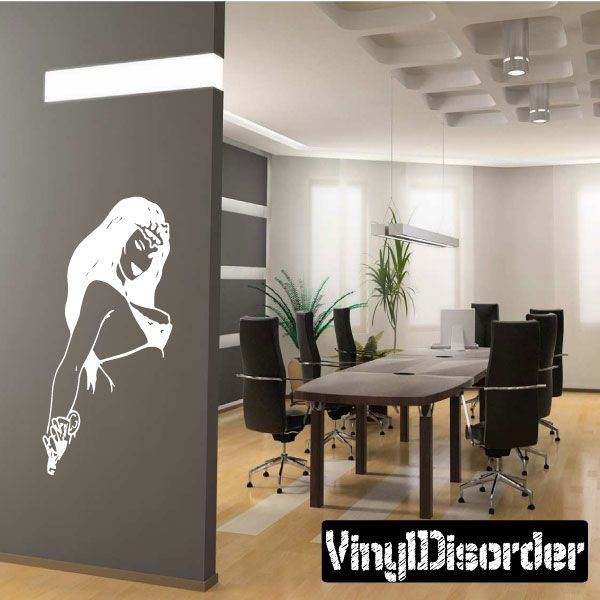 Wall decal of a woman in a cupless bra, white outline silhouette