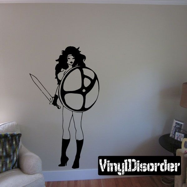 Woman silhouette wall decal with shield emblem and high heels