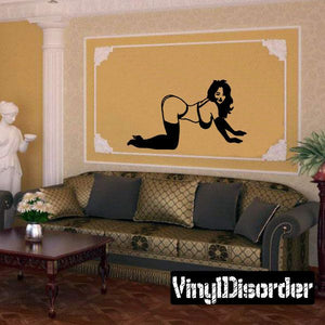 Black silhouette lingerie decal of a woman on all fours