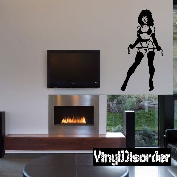 Whip-themed vinyl wall decal featuring a black cartoon woman with whip