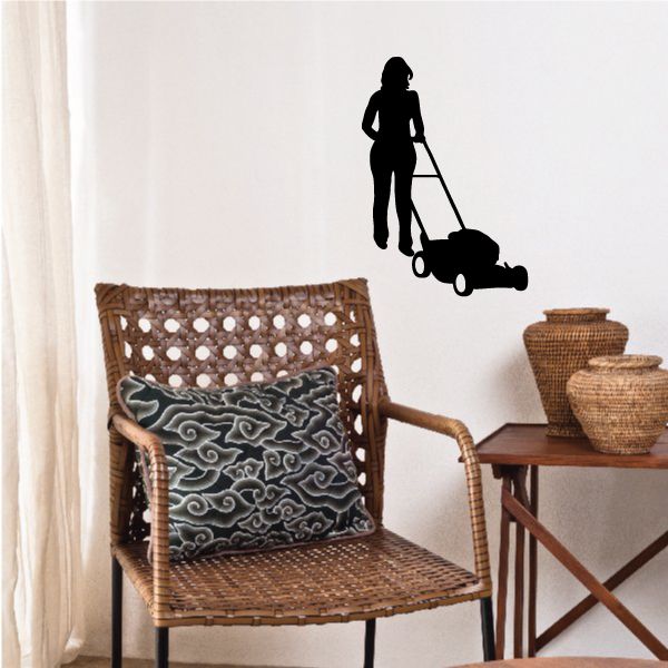 Woman mowing lawn decal, black silhouette holding a push mower