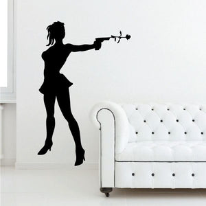 Silhouette wall decal of woman holding a flower spray