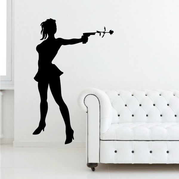 Silhouette wall decal of woman holding a flower spray