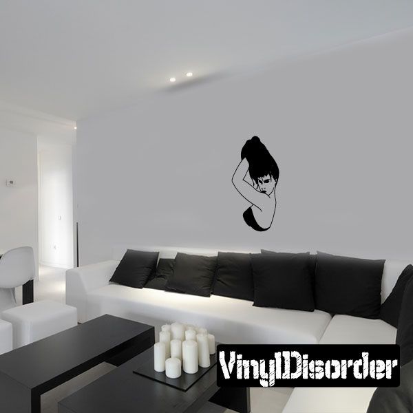 Wall vinyl decal featuring a woman posing with hands in her hair