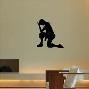 Praying woman decal, black silhouette with head bowed and one hand on head